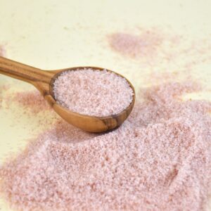 Wooden spoon with fine Himalayan pink salt