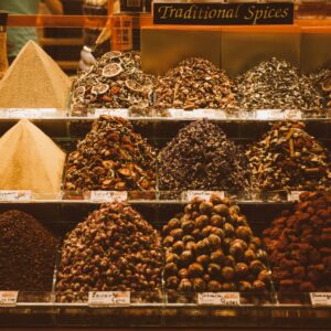 Spice bazaar display with mounds of traditional spices